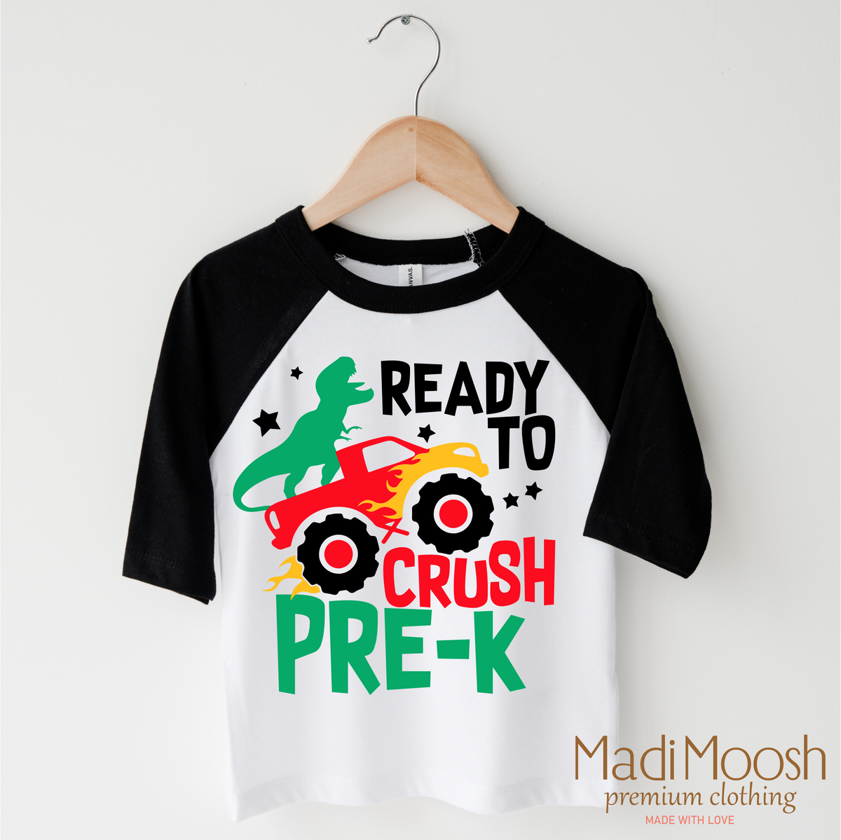 I'm Ready To Crush Pre-K Dinosaur Monster Truck design on a black-accented shirt.