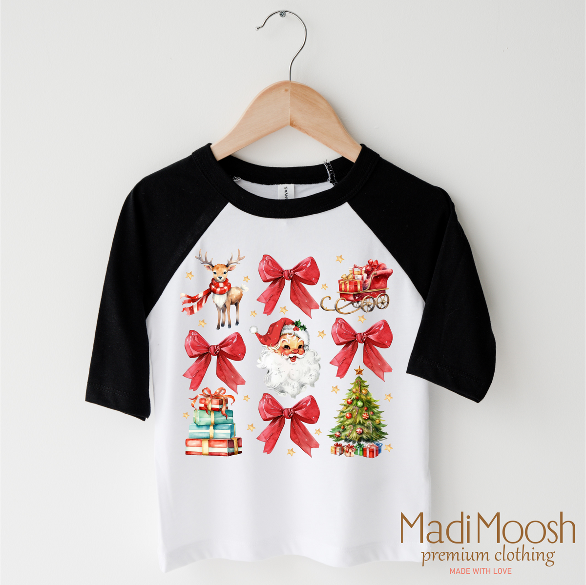 Santa Bows and Christmas design on a black-accented shirt.