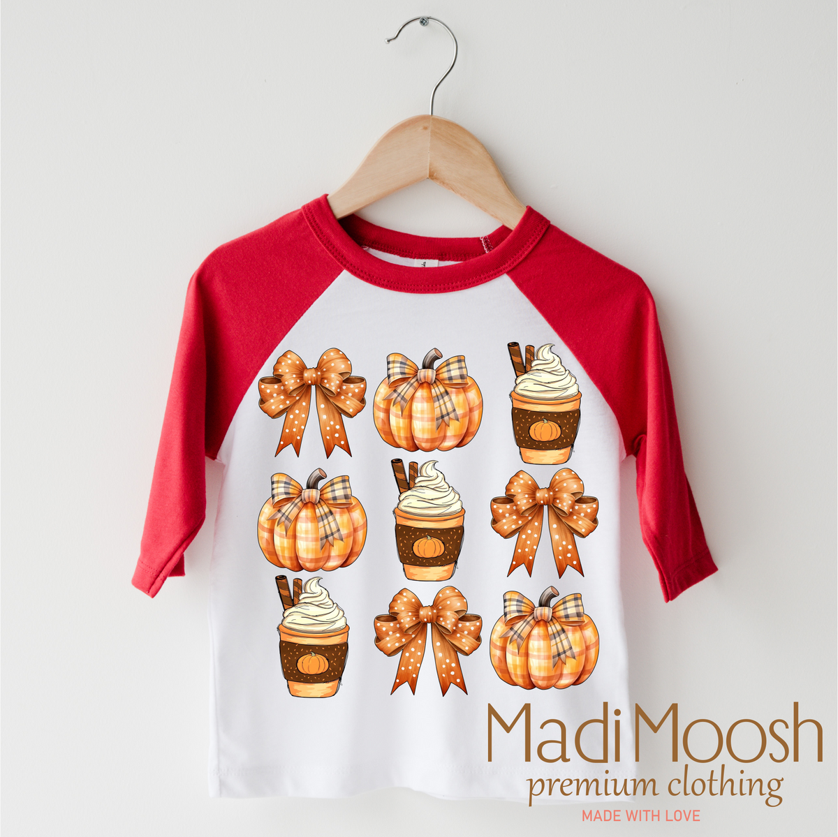 Pumpkins design on a red-accented shirt.