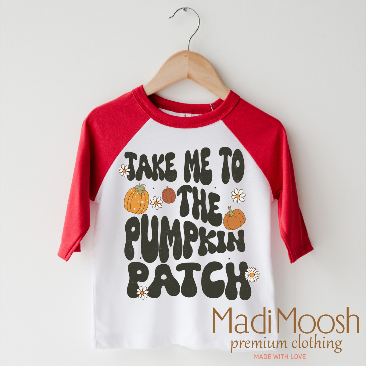 Take Me To The Pumpkin Patch design on a red-accented shirt.