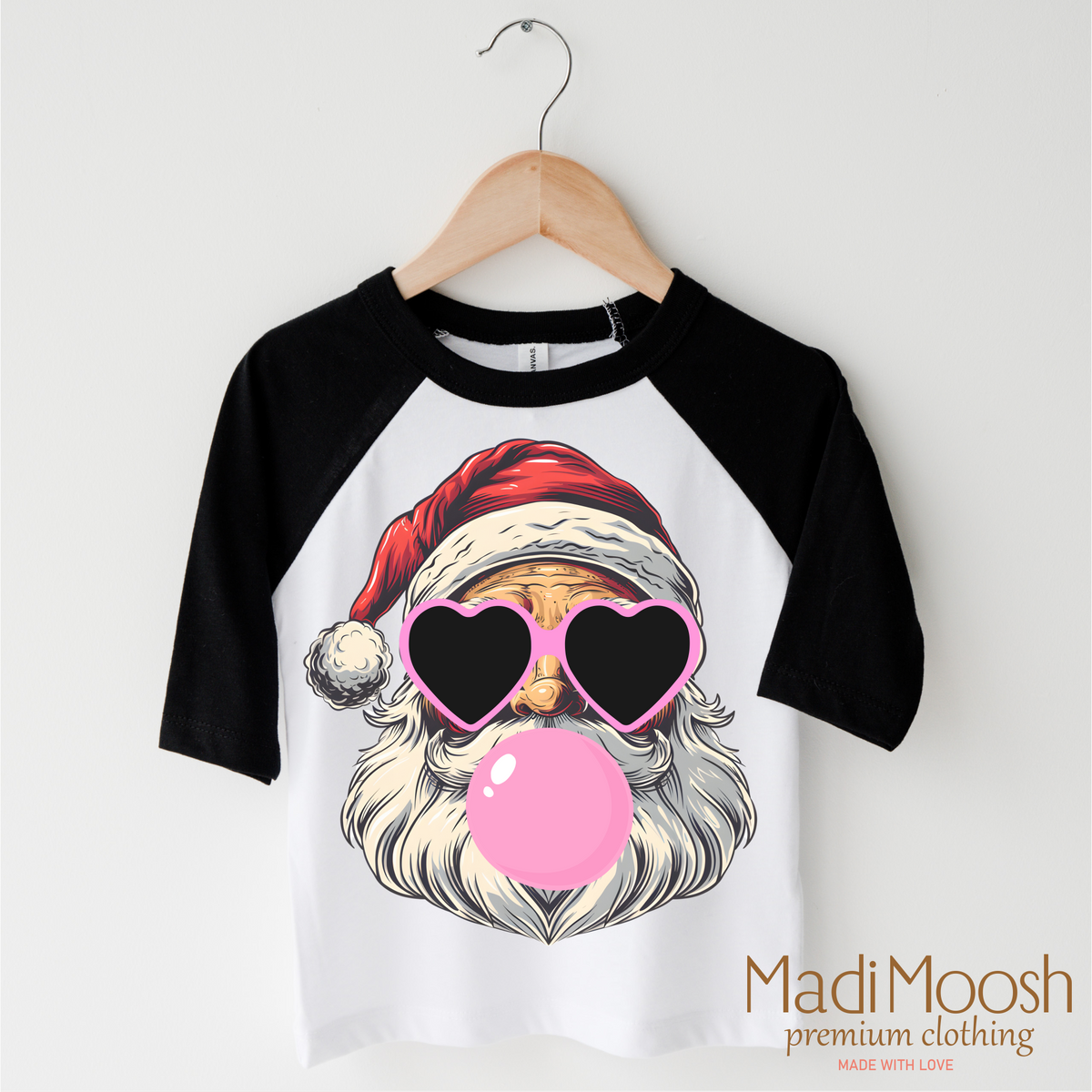 Santa Claus Blowing Bubbles Christmas design on a black-accented shirt.