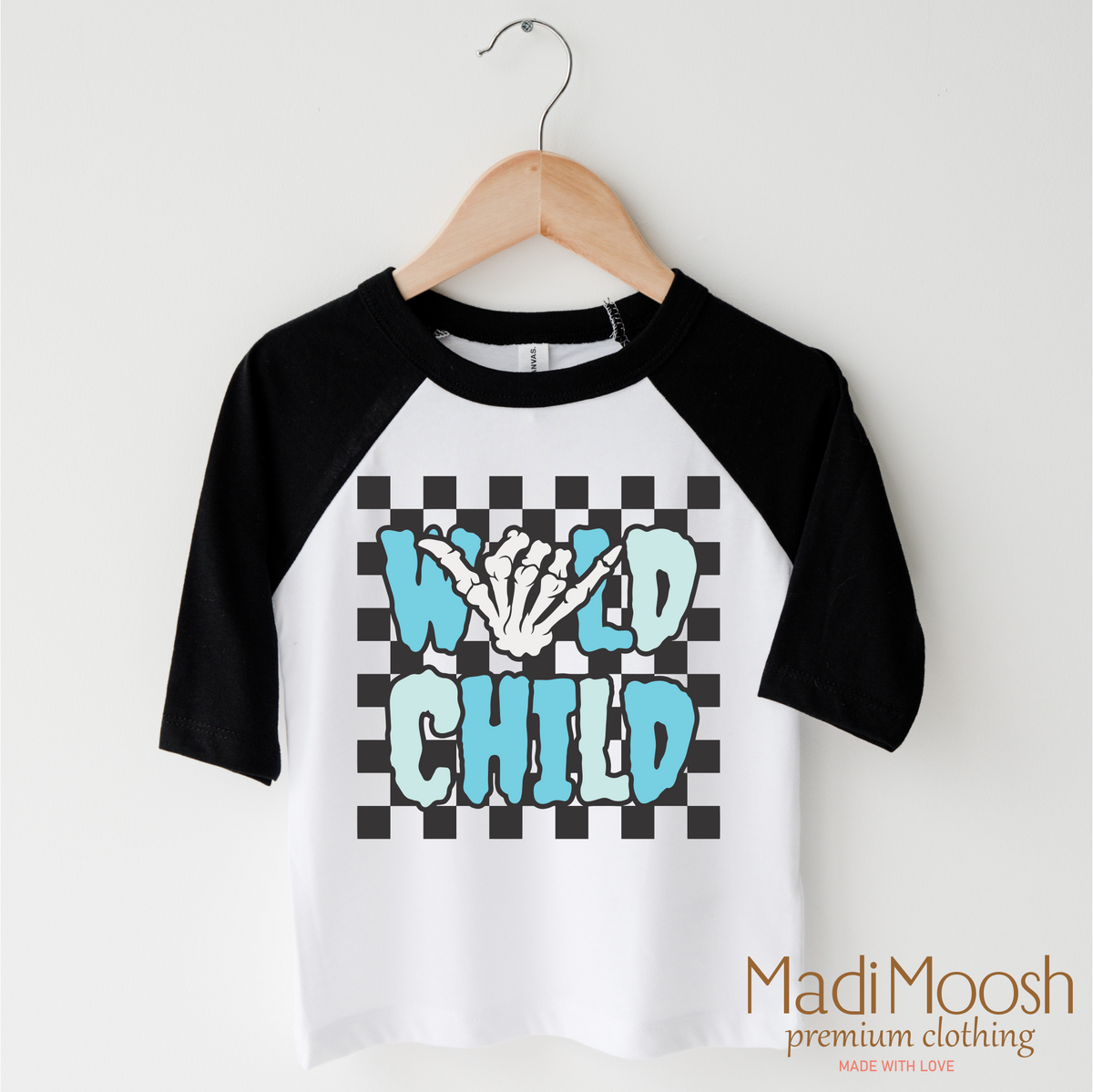Wild Child Halloween design on a blue garment.