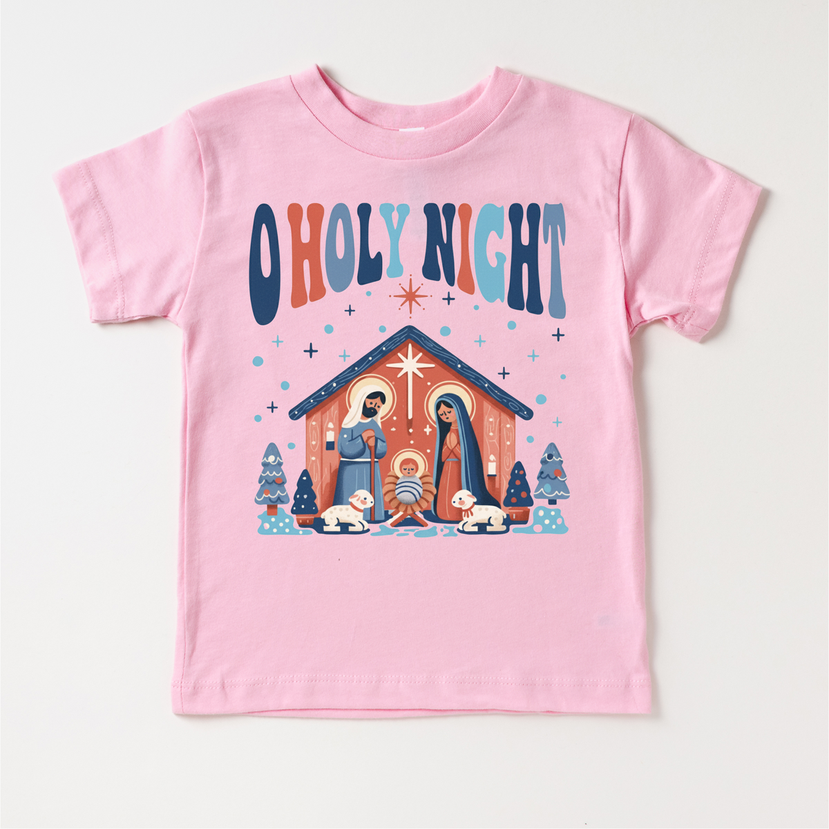 O Holy Night Christmas design on a pink garment.
