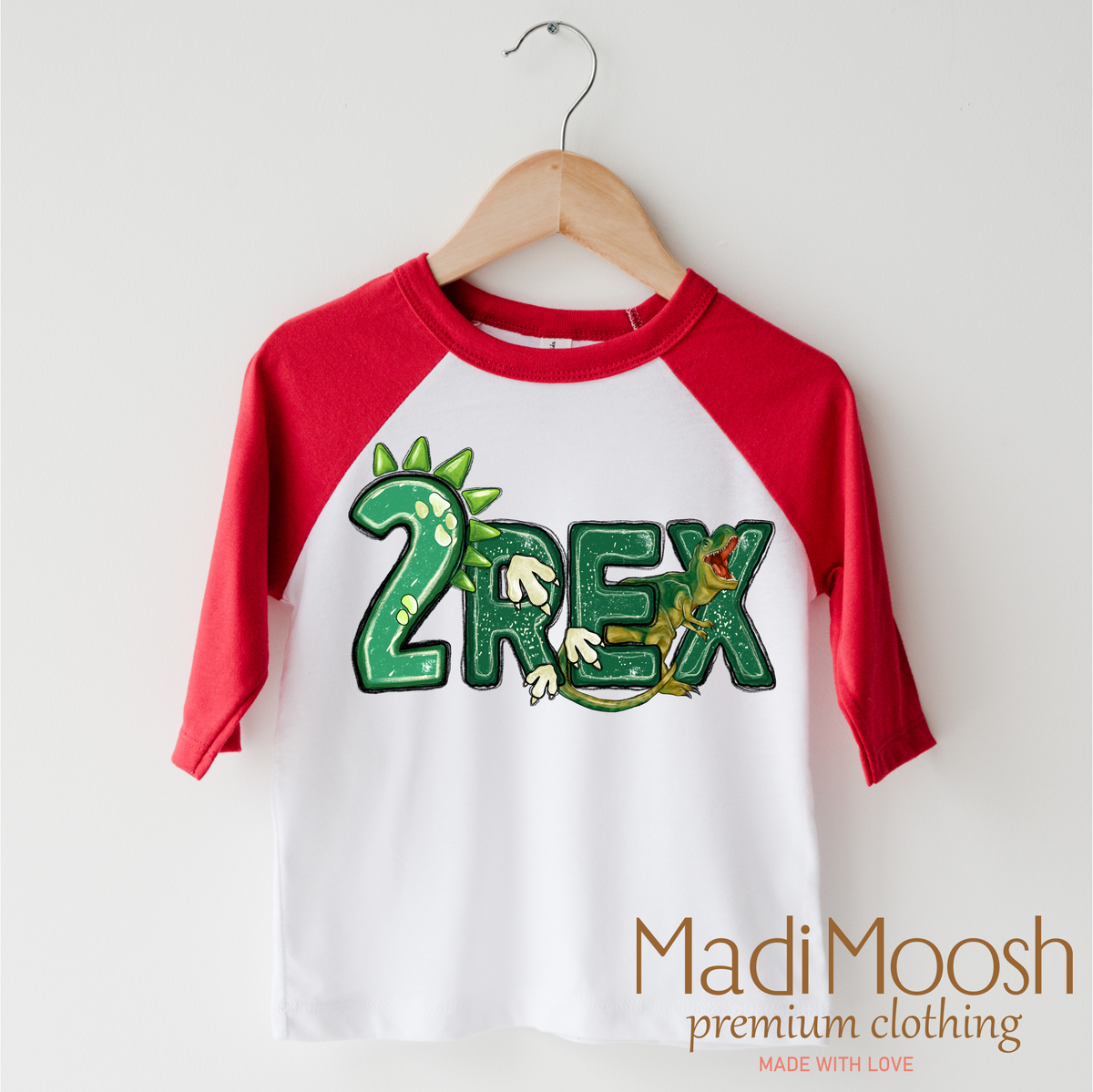 Two Rex Boys Birthday design on a red-accented shirt.