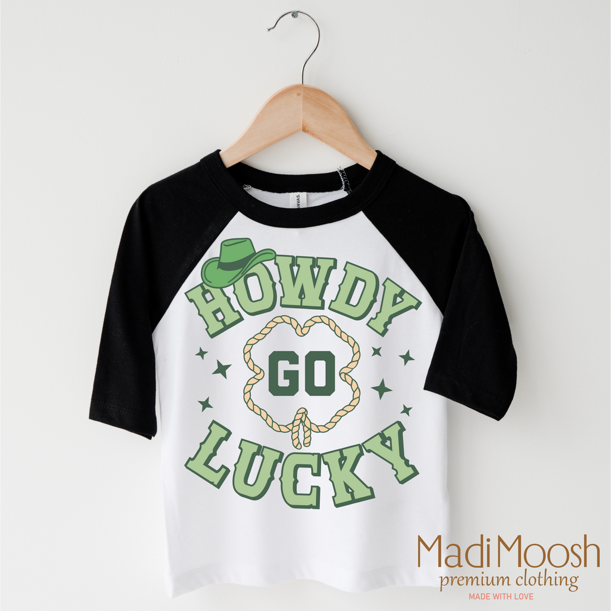 Howdy Go Lucky Western St. Patrick's Day design on a black-accented shirt.