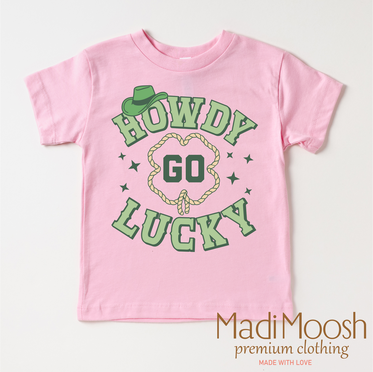 Howdy Go Lucky Western St. Patrick's Day design on a pink garment.