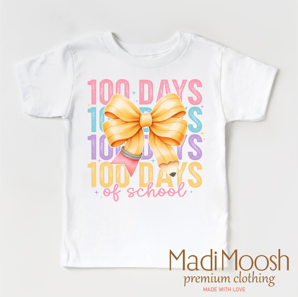 100 Days Of School Bow design on a white garment.