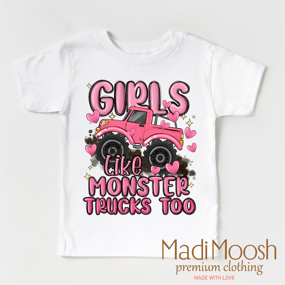 Girls Like Monster Trucks Too design on a white garment.
