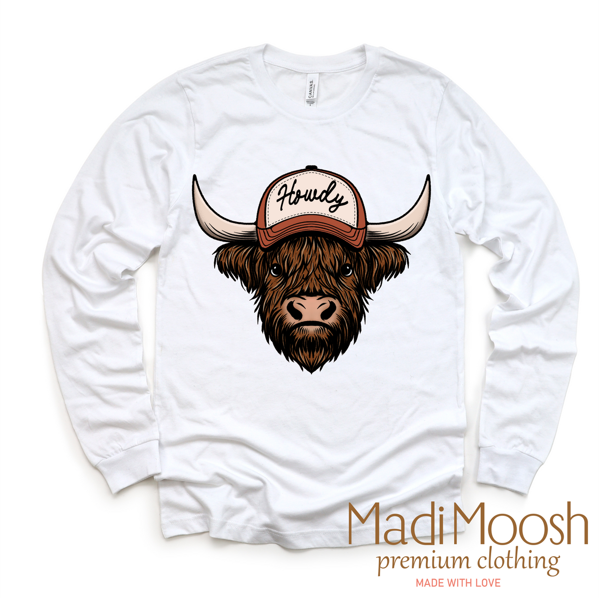 Howdy Highland Cow Western design on a long sleeve shirt.