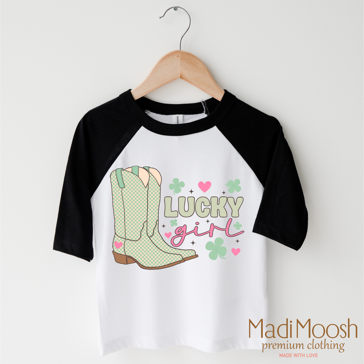 St. Patrick's Day Lucky Cowgirl design on a black-accented shirt.
