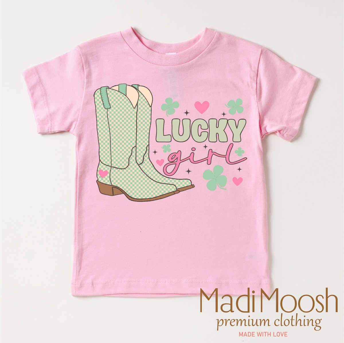 St. Patrick's Day Lucky Cowgirl design on a pink garment.