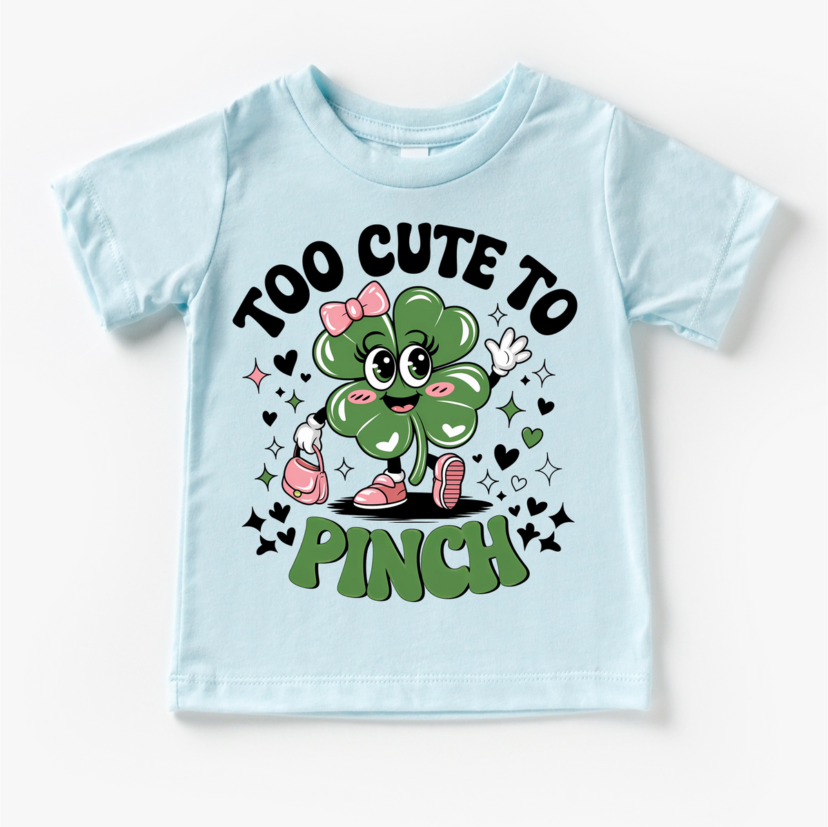 Too Cute To Pinch St. Patrick's Day design on a blue garment.