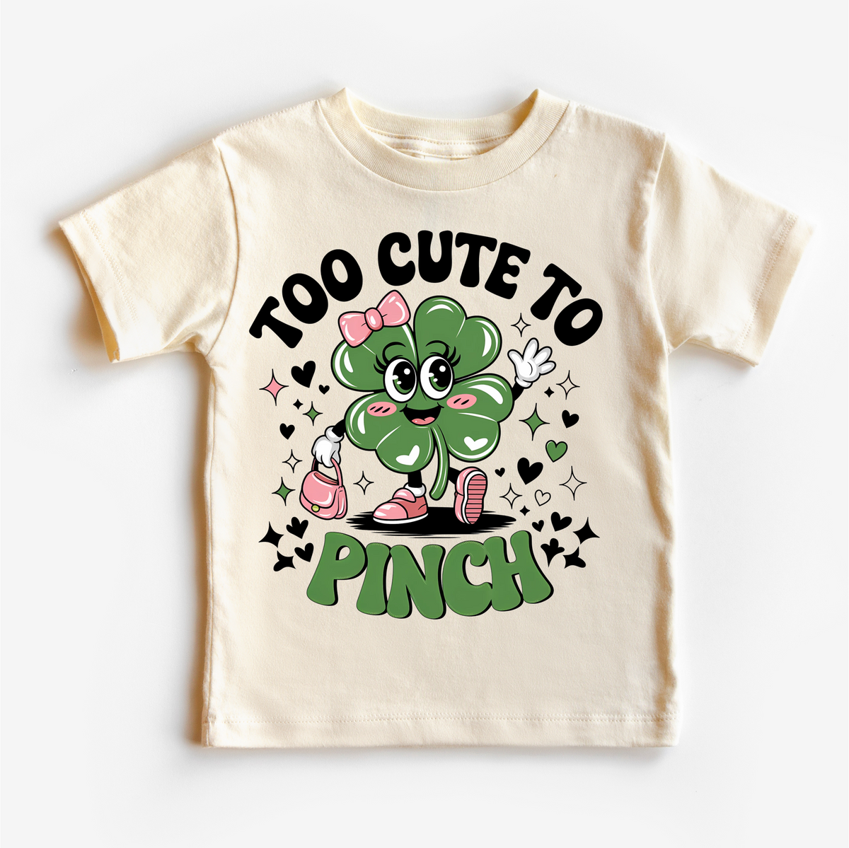 Too Cute To Pinch St. Patrick's Day design on a natural garment.