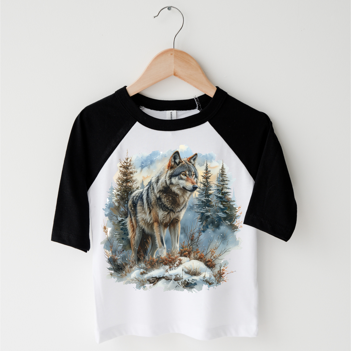 Retro Wolf Watercolor Nature Scene design on a black-accented shirt.