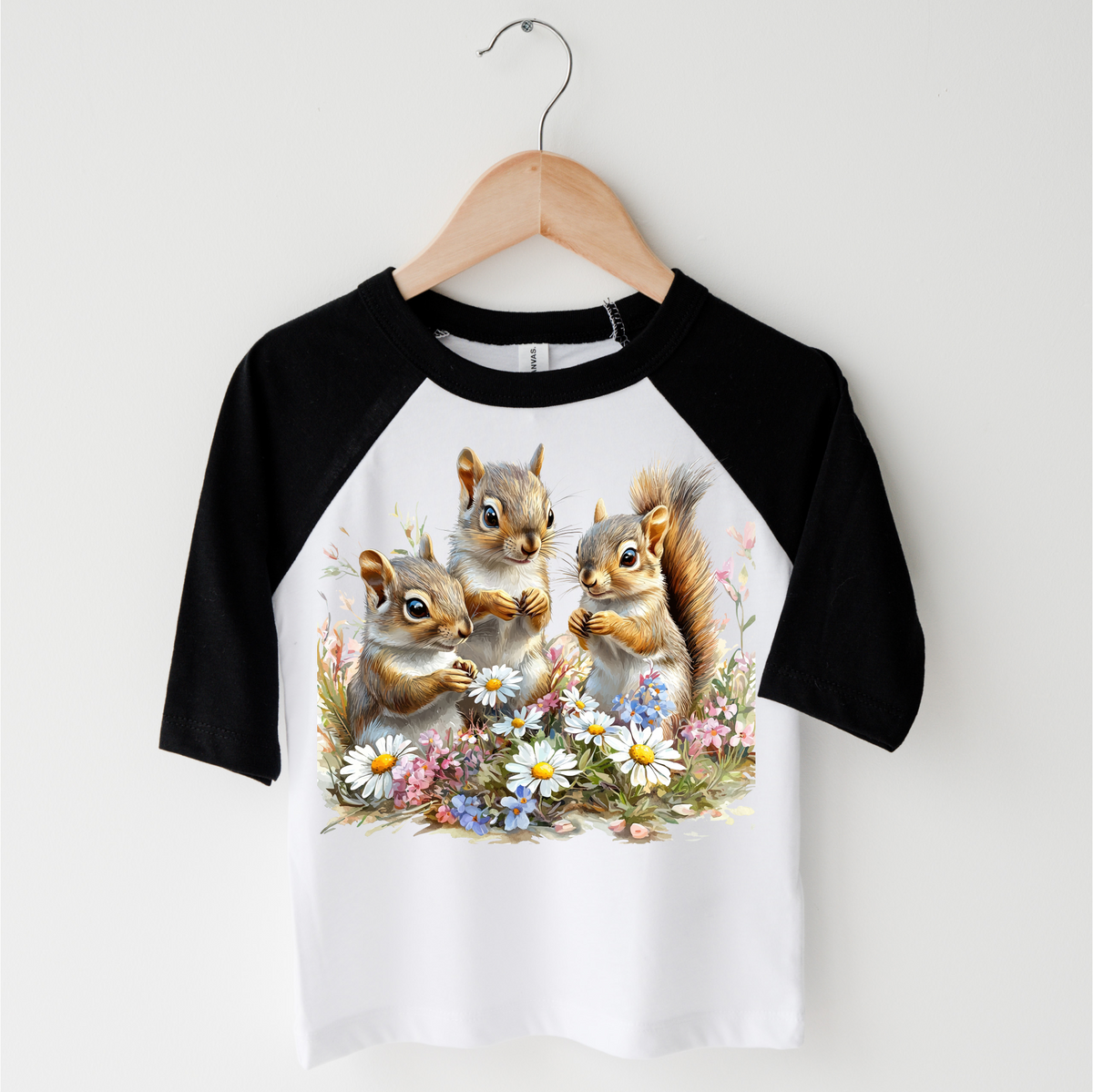 Retro Squirrel Watercolor Nature Scene Spring design on a black-accented shirt.