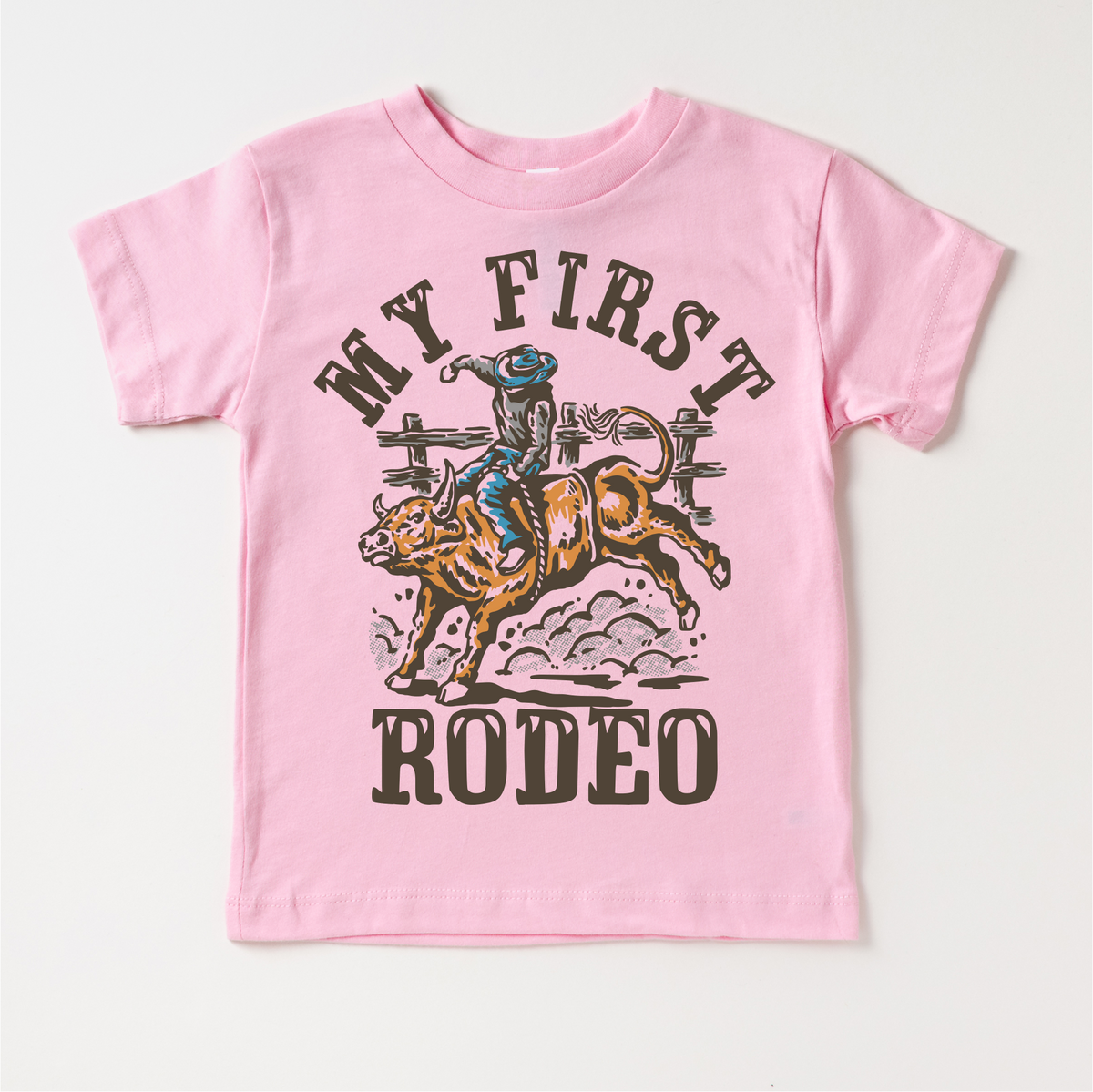 My First Rodeo Birthday design on a pink garment.