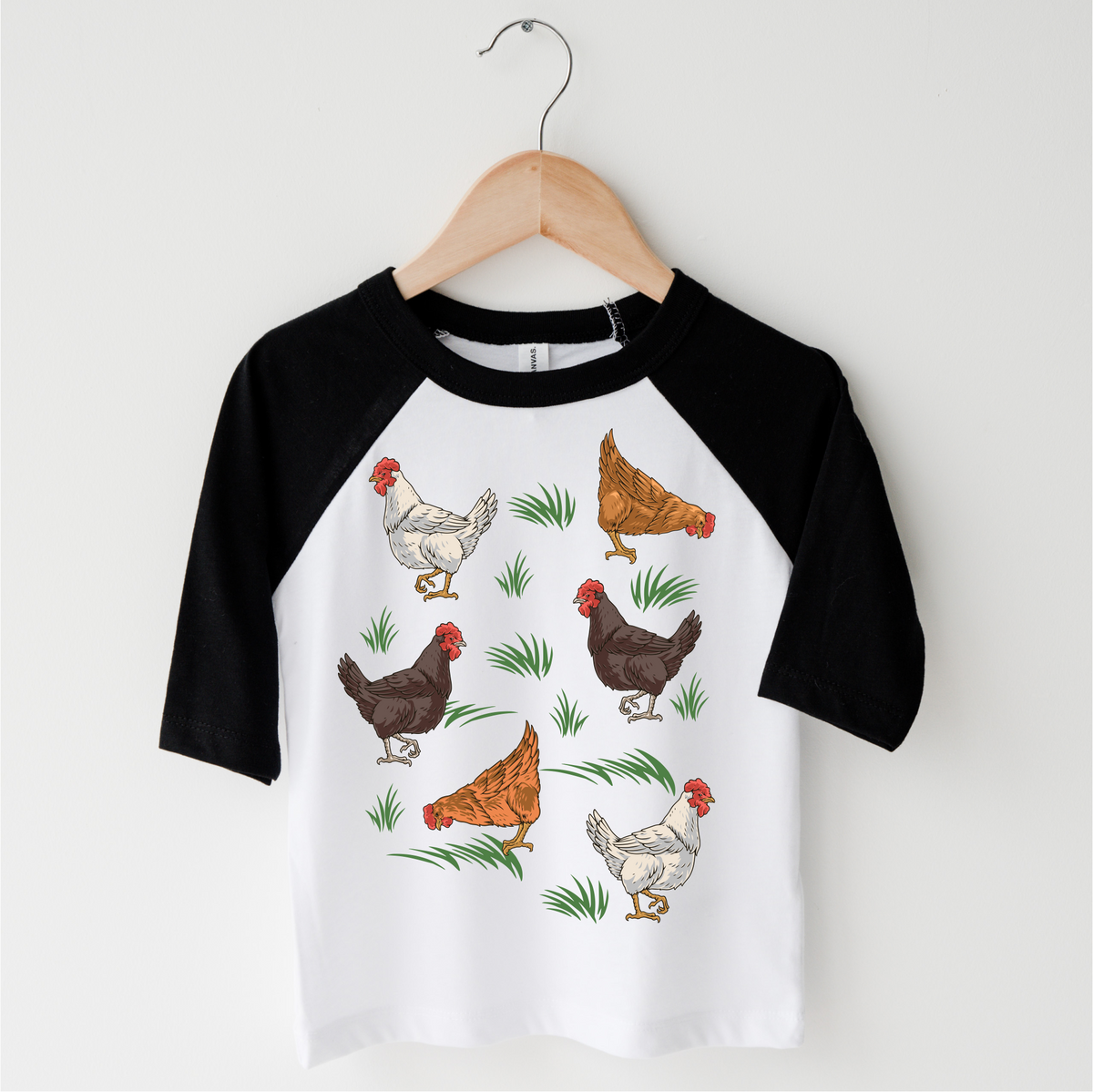 Cute Retro Chicken Farm design on a black-accented shirt.