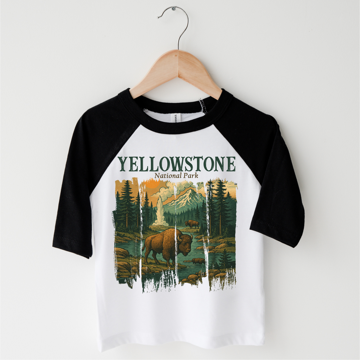 Yellowstone Natural Park design on a black-accented shirt.