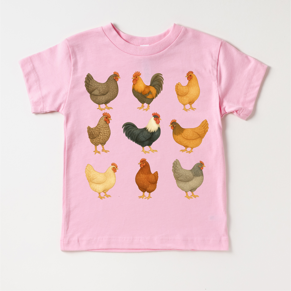 Chicken Rooster Farm design on a pink garment.