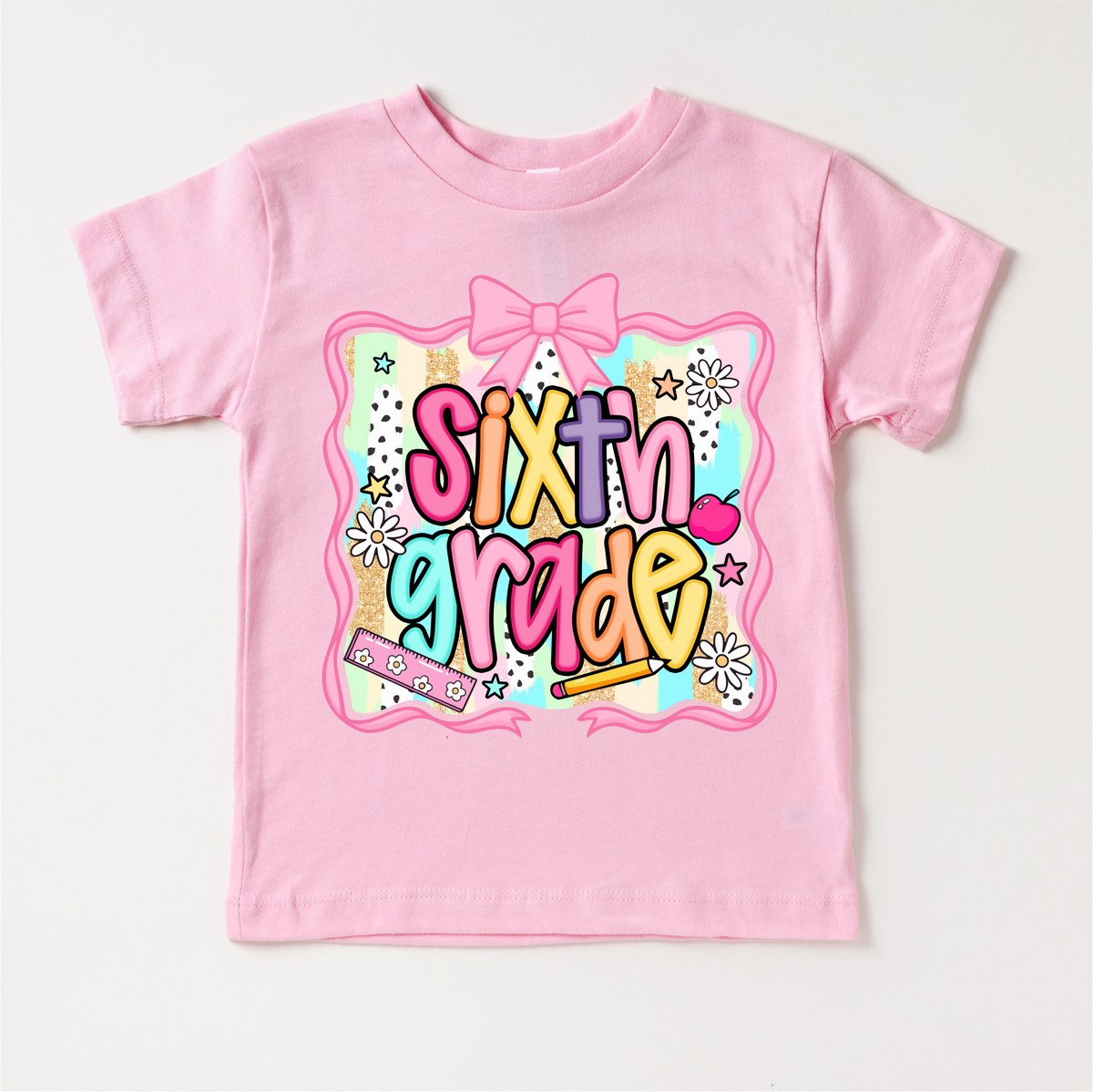 Girls 6th Grade School design on a pink garment.