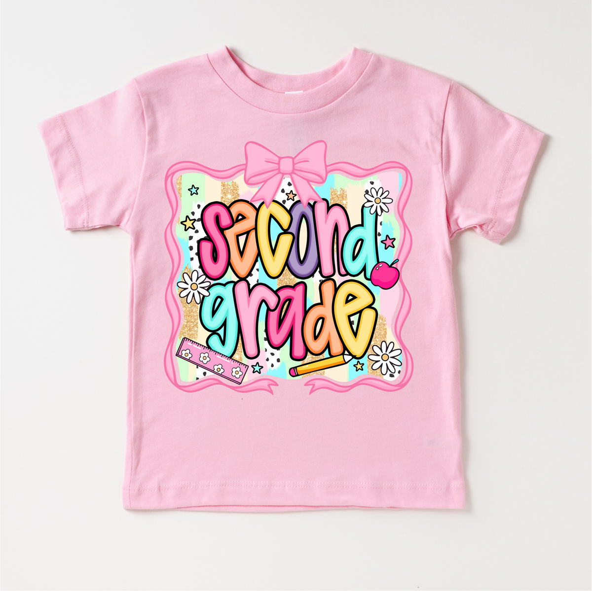 Girls 2nd Grade School design on a pink garment.