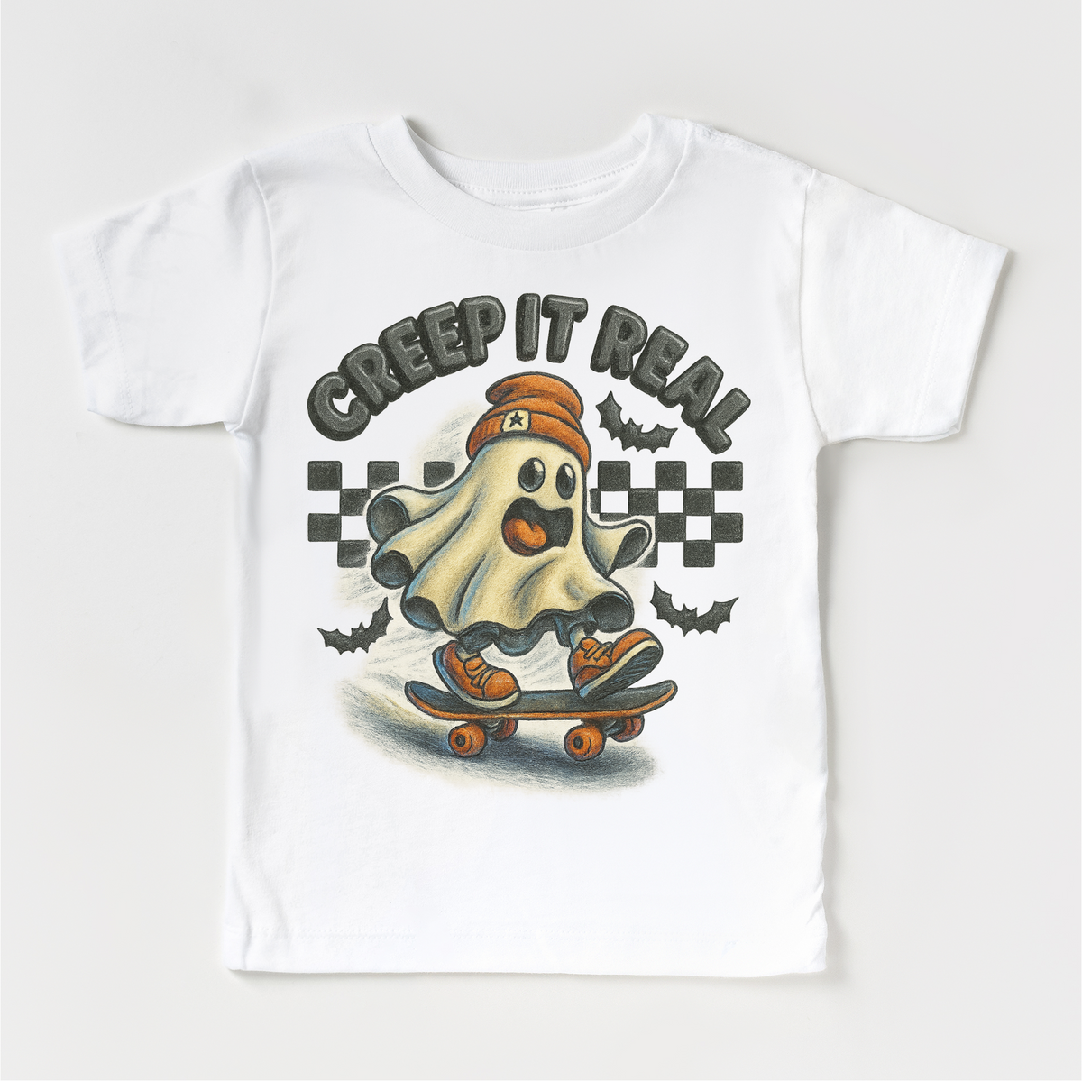 Creep It Real Skateboard Ghost Halloween design on a white garment.