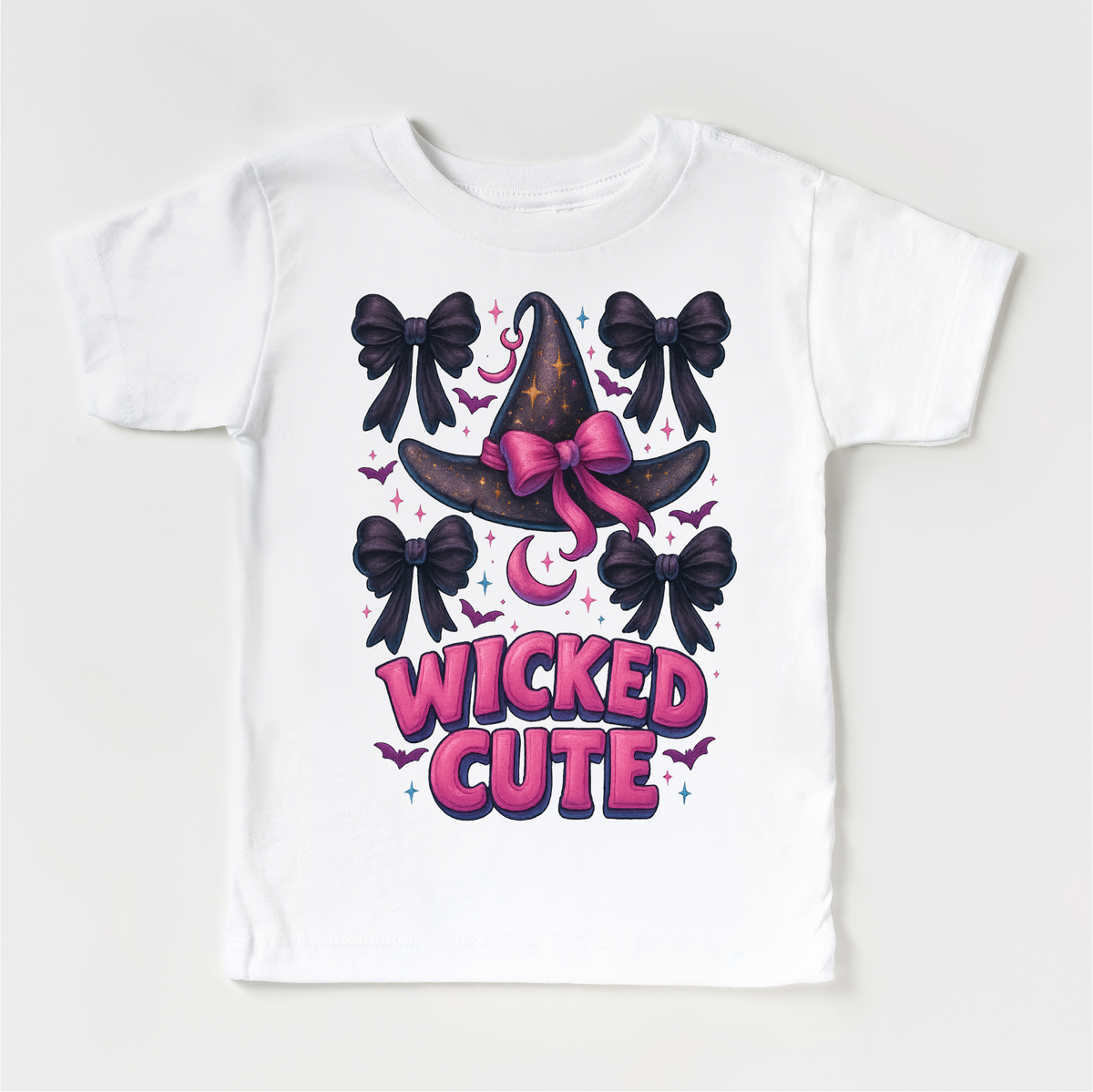 Wicked Cute Witch design on a white garment.