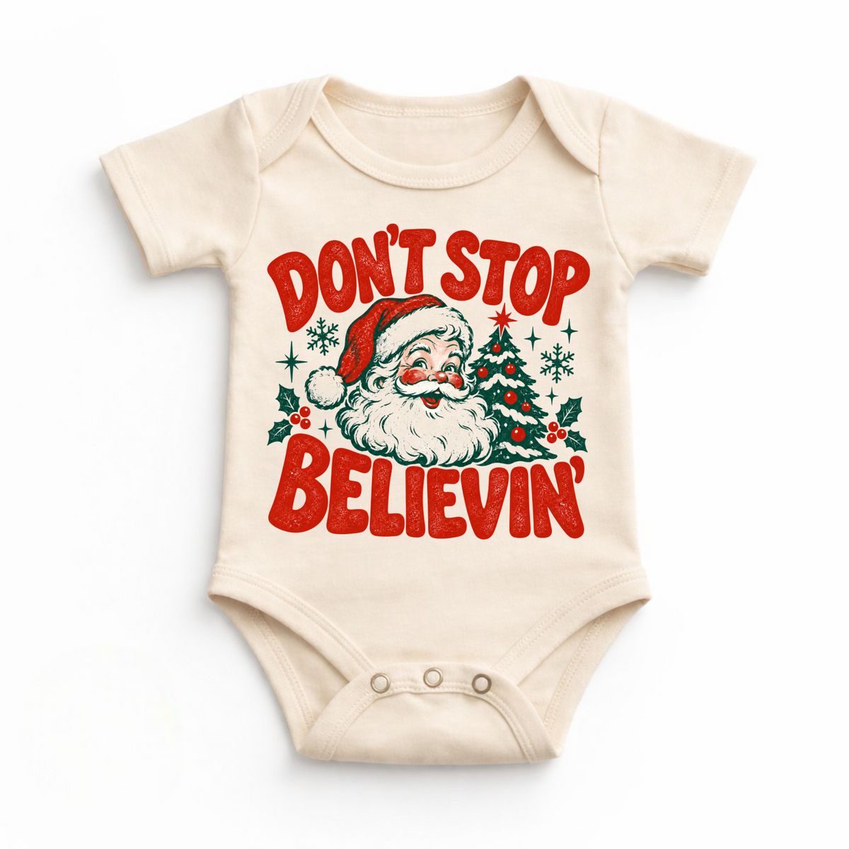 Don't Stop Believin' retro Santa and Christmas tree graphic in red and green on a natural baby bodysuit