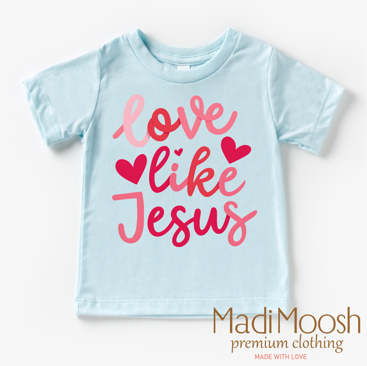 Love Like Jesus Valentine's Day design on a blue garment.
