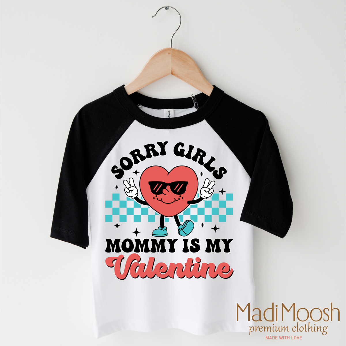 Sorry Girls Mommy's My Valentine's Day design on a black-accented shirt.