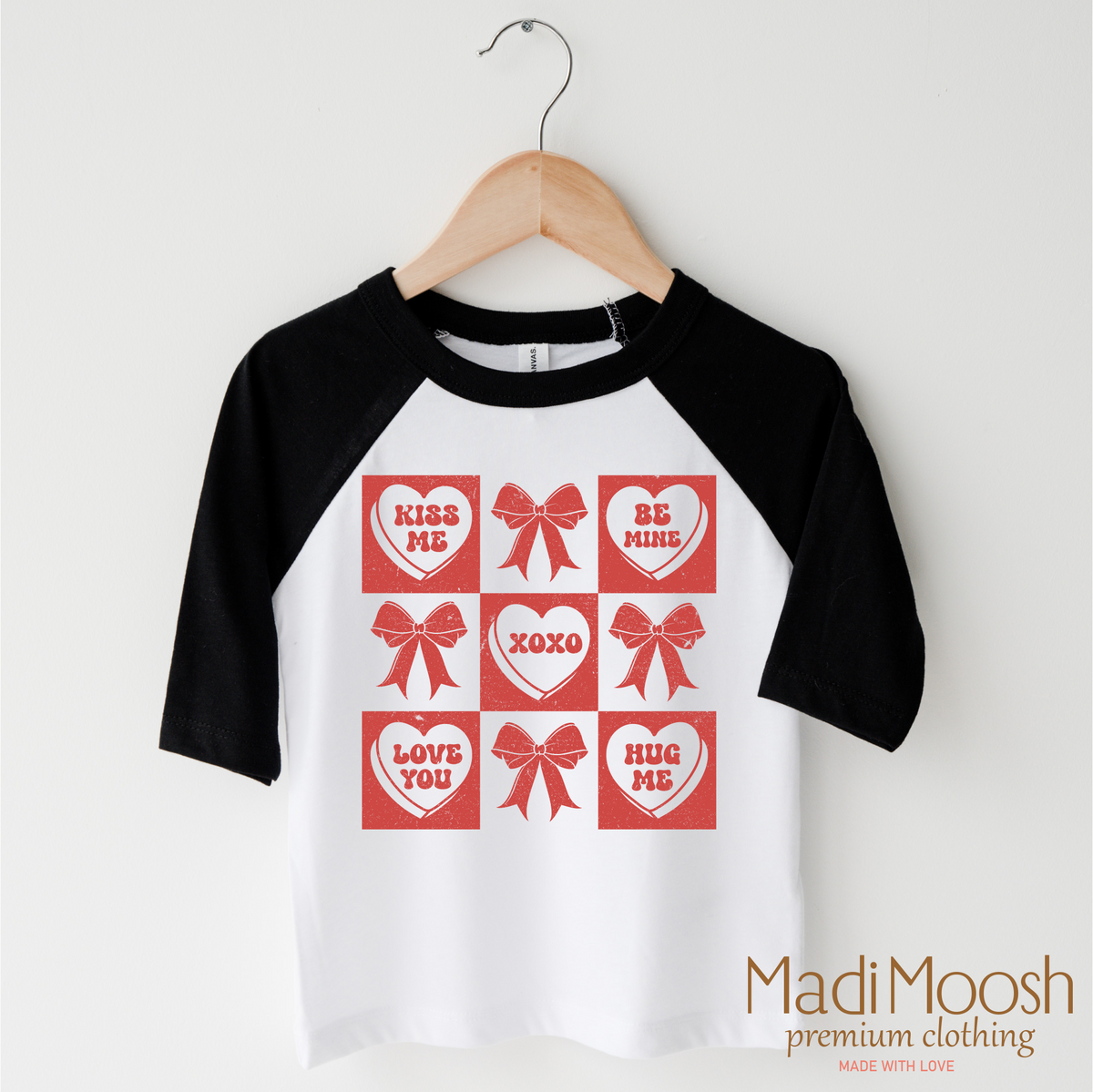 Candy Hearts And Bows Valentine's Day design on a black-accented shirt.