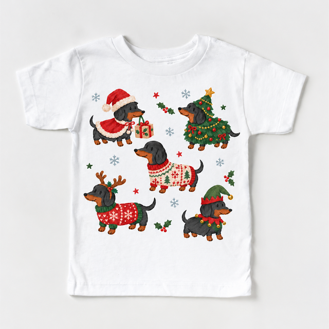 white tee with five dachshunds in Christmas costumes, holly and snowflakes