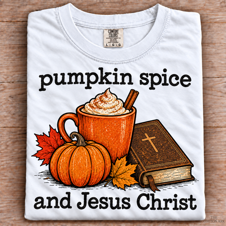 White folded Comfort Colors Pumpkin Spice and Jesus Christ Shirt