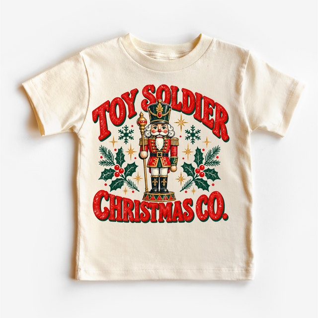 natural tee with vintage nutcracker, holly and Toy Soldier Christmas Co. lettering