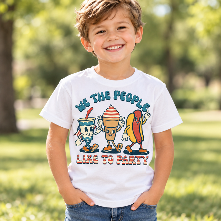 Child wearing a white We The People Like To Party Shirt outdoors