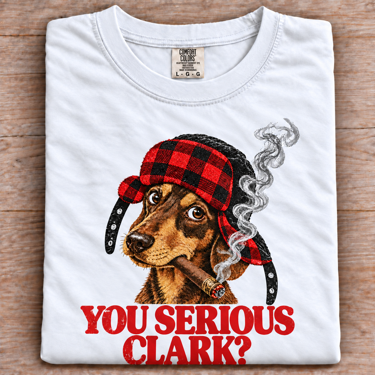 White Comfort Colors T-shirt with You Serious Clark dog graphic and red buffalo plaid hat