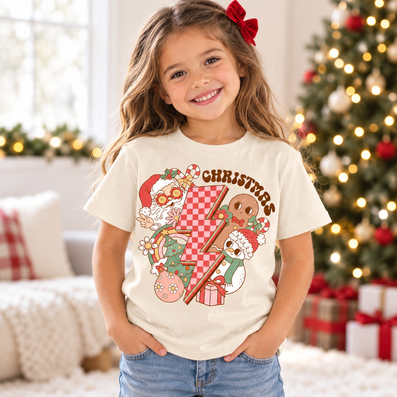 Child wearing natural Christmas Characters Shirt in a festive Christmas setting