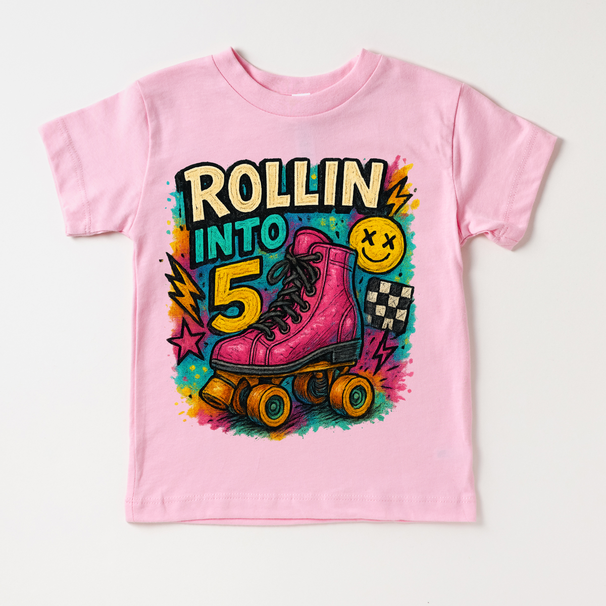 Rollin Into 5 Roller Skating Birthday design on a pink garment.
