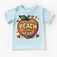 You've Got A Peach Of My Heart Fruit design on a blue garment.