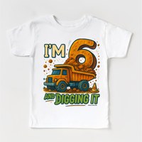 I'm Six And Digging It Birthday design on a white garment.