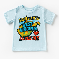 Somebody Loves Me In West Virginia design on a blue garment.