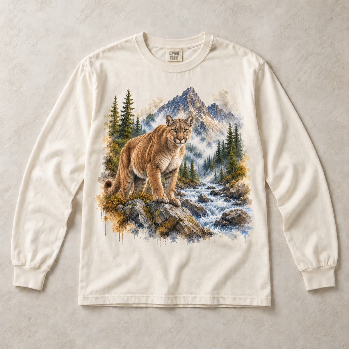 Ivory Comfort Colors long-sleeve T-shirt with Cougar Mountain graphic, front flat lay