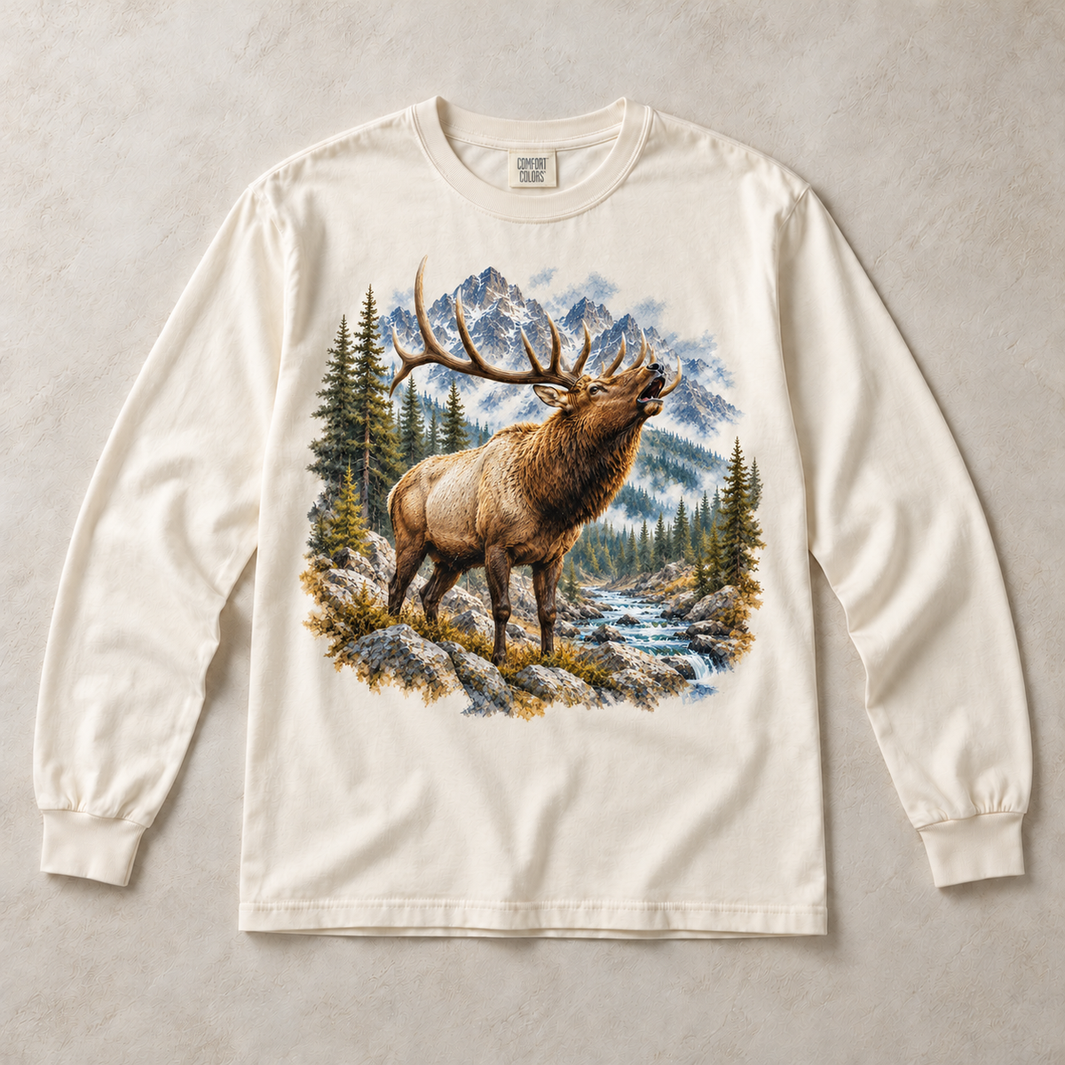 Ivory Comfort Colors long-sleeve T-shirt with Elk Mountain graphic, front flat lay