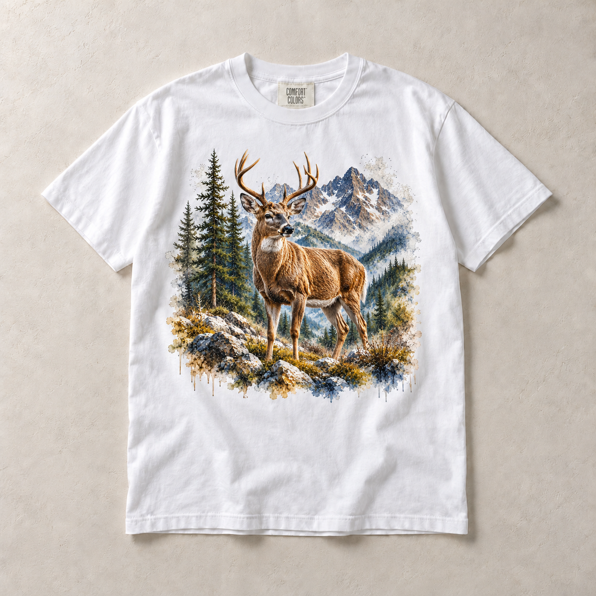 White Comfort Colors short-sleeve T-shirt with Deer Mountain graphic, front flat lay