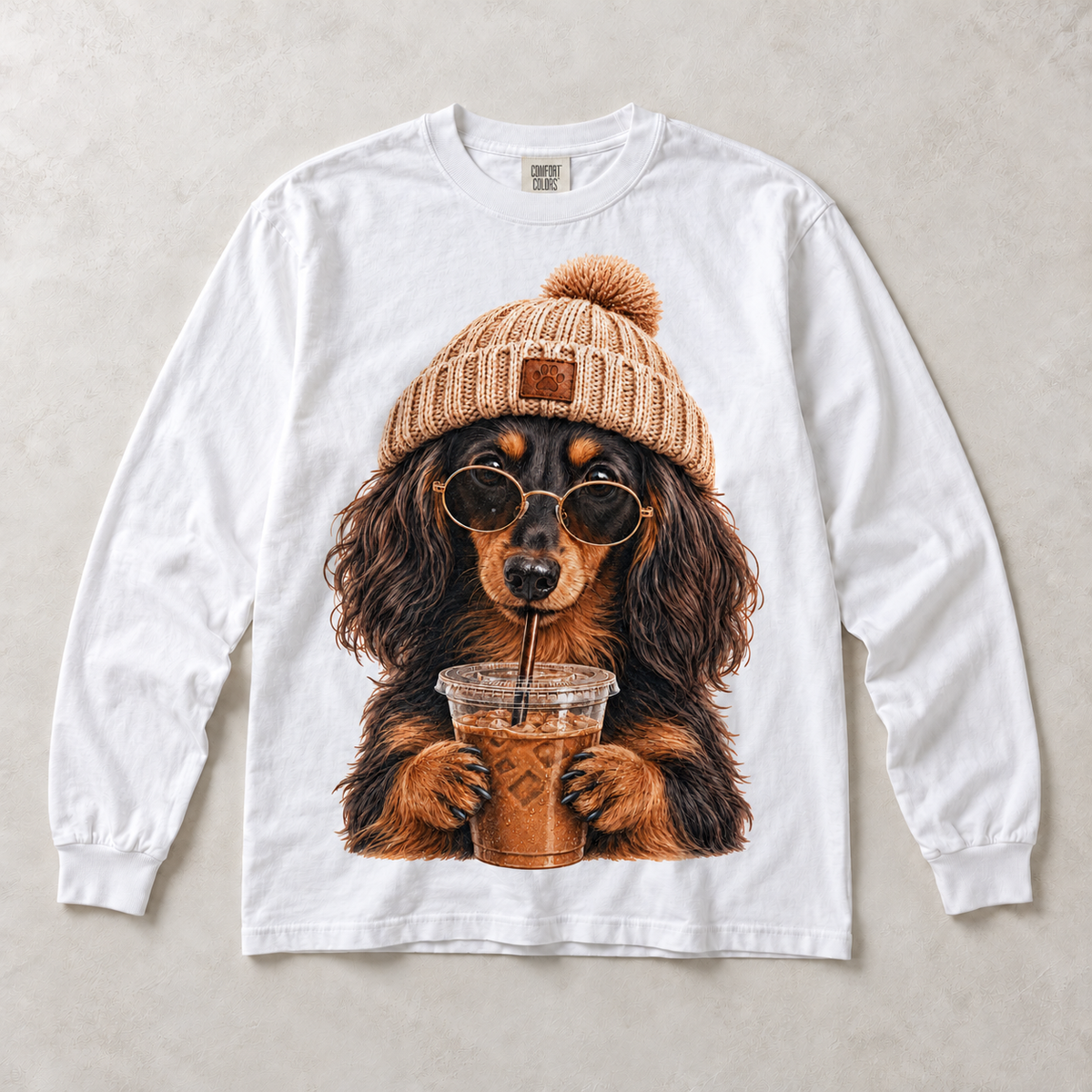 White Comfort Colors long-sleeve T-shirt with Long Haired Dachshund Iced Coffee graphic, front flat lay