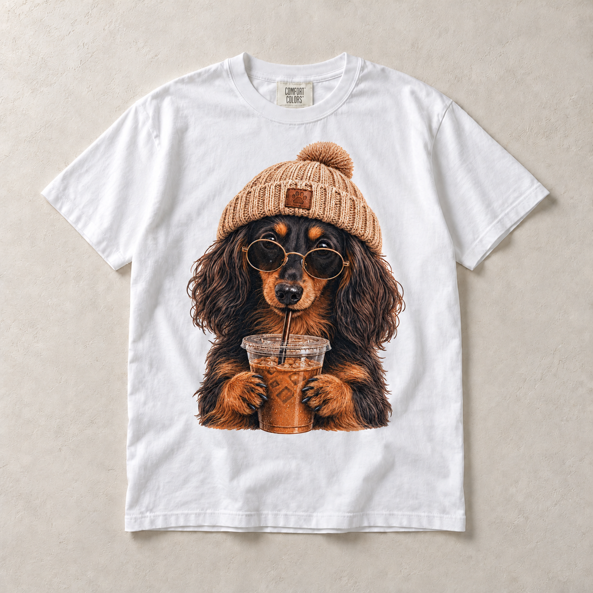 White Comfort Colors short-sleeve T-shirt with Long Haired Dachshund Iced Coffee graphic, front flat lay