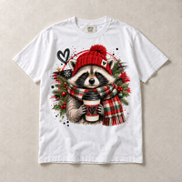White Comfort Colors short-sleeve T-shirt with Christmas Raccoon Coffee graphic, front flat lay