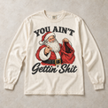 Ivory Comfort Colors long-sleeve T-shirt with You Ain't Gettin' Shit Funny Santa Christmas graphic, front flat lay
