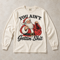 Ivory Comfort Colors long-sleeve T-shirt with You Ain't Gettin' Shit Funny Santa Christmas graphic, front flat lay