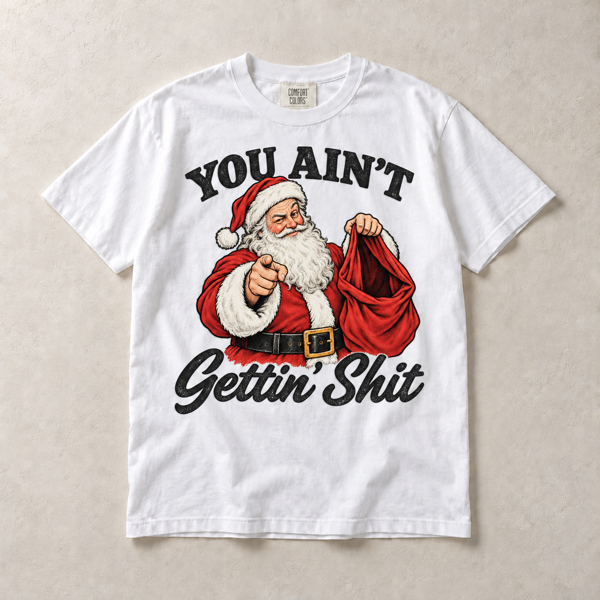 White Comfort Colors short-sleeve T-shirt with You Ain't Gettin' Shit Funny Santa Christmas graphic, front flat lay